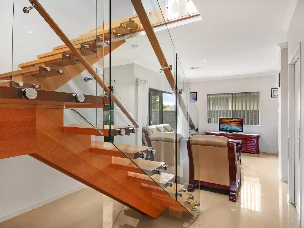 1/2 Compass Drive, Biggera Waters Leased by  - image 1