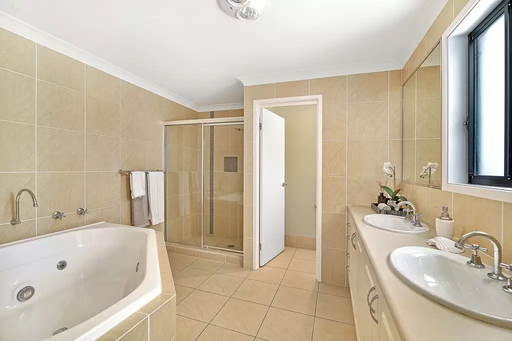 225 Chesterfield Drive, Bonogin Sold by Queensland Sotheby's International Realty - image 1