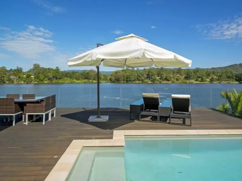 59 Brittany Drive, Oxenford Sold by Queensland Sotheby's International Realty - image 1