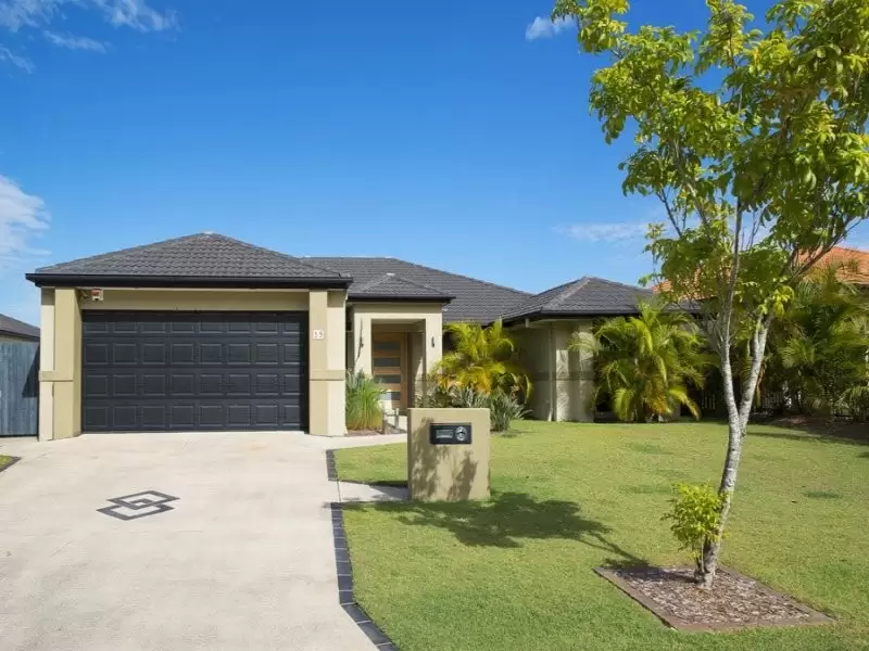 59 Brittany Drive, Oxenford Sold by Queensland Sotheby's International Realty - image 1