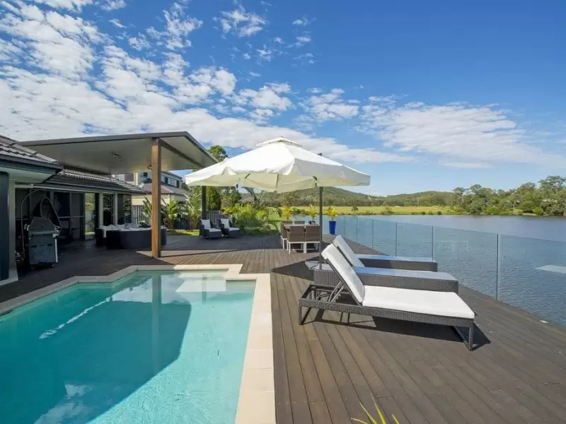 59 Brittany Drive, Oxenford Sold by Queensland Sotheby's International Realty - image 1