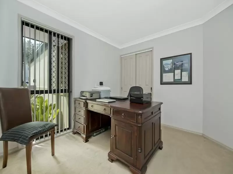 59 Brittany Drive, Oxenford Sold by Queensland Sotheby's International Realty - image 1