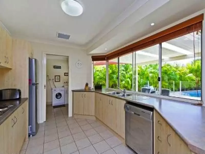 14 Taroona Circuit, Oxenford Sold by Queensland Sotheby's International Realty - image 1