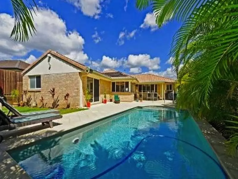 14 Taroona Circuit, Oxenford Sold by Queensland Sotheby's International Realty - image 1
