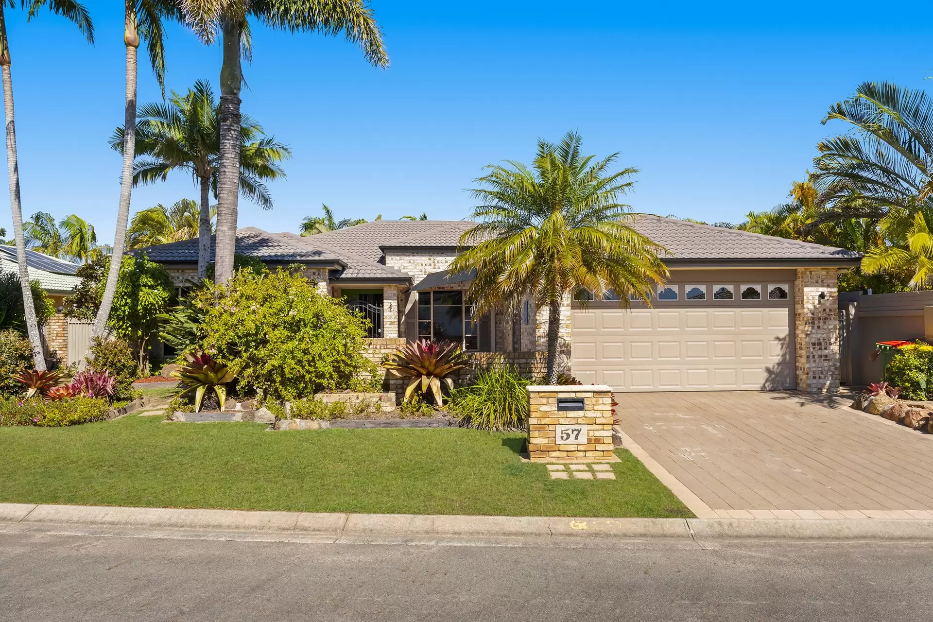 57 Martingale Circuit, Clear Island Waters Sold by Queensland Sotheby's International Realty - image 1
